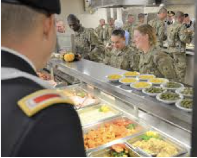 Soldiers getting food from the dining hall